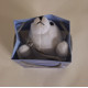 Peluche Phoque blanc dans pochette cadeau